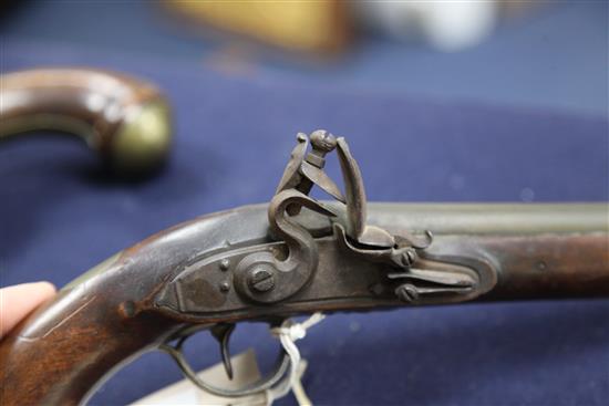 A pair of early 19th century flintlock holster pistols, signed Weston, Lewes, 15in.